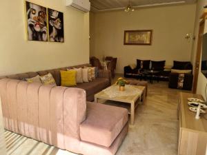 Appartement résidence kettani jardin privatif accès direct piscine et aire de jeu