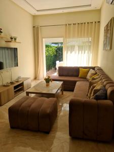 Appartement résidence kettani jardin privatif accès direct piscine et aire de jeu