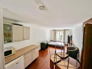 Appartements Grand Studio - Proche Hyper centre - Calme & Tout Equipe : photos des chambres