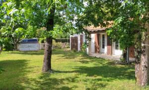 Maison à 8 min à pied de la Plage avec jardin clos et ombragé