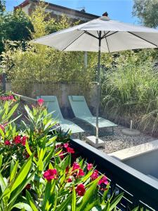 COLIBRI-Design&Beach Appartement mit 40m2 Terrasse und 2 SUPs 