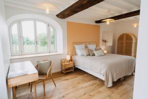 Appartements Le Clos d'Omaha - Suites luxueuses a 5 min d'Omaha Beach : photos des chambres