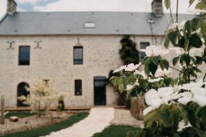 Appartements Le Clos d'Omaha - Suites luxueuses a 5 min d'Omaha Beach : photos des chambres
