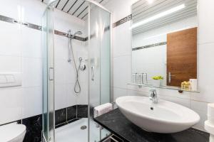 Double Room with Balcony and Mountain View room in Sporthotel Cristall