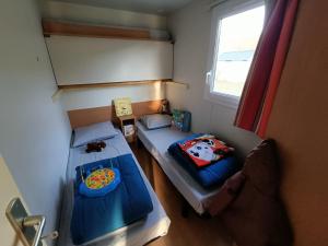 Villages vacances Camping Paradis Marmotel : photos des chambres