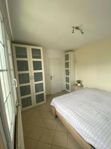 Sejours chez l'habitant L-Oasis : photos des chambres