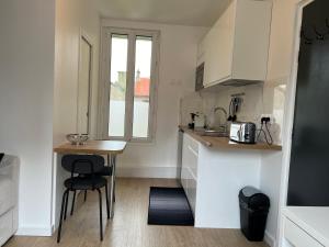 Appartements Cosy studio aux portes de Paris : photos des chambres