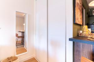 Appartements Cocon Colore - Studio pour 2 30min de Paris : photos des chambres