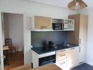 Appartements Les Pivoines : photos des chambres