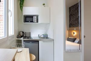 Appartements Appartement 3 proche de la gare et du centre ville : photos des chambres