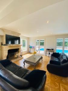 Villas Villa avec piscine Saint-Nom-le-Breteche : photos des chambres