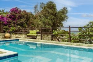 Three-Bedroom Pool Suite Sea View room in Anassa Mare Villas & Residences