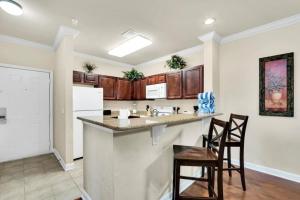 Poolside condo at Tuscana Resort Summer specials