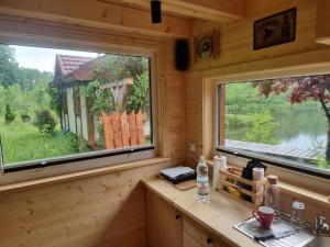 Domek de Janauis i jeziorko