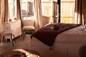 Maisons de vacances Le coquillage, la clef des paons : photos des chambres