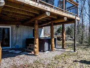 Chalet bois rond avec spa, foyer et nature privée