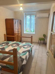 Maisons de vacances maison de 100 m2 comprenant 3 chambres avec jardin : photos des chambres