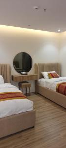 شقة غرفتين نوم وصالة فندقية