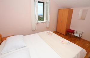 Apartments with parking space Zedno, Ciovo - 23279