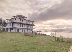 HOTEL TOTA ELISEO PLAYA BLANCA LAGO DE TOTA