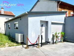 Appartements GALAXY SPA - Suite Jupiter Jacuzzi Privatif : photos des chambres