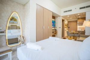 Zapbed House - Modern Studio in Azizi Riviera 27 Meydan One