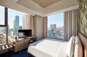 Phòng Deluxe Giường Đôi Ở Góc (Deluxe Corner Double Room)