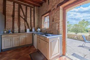 Maisons de vacances Le Moutou - Maison avec piscine : photos des chambres