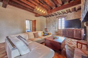 Maisons de vacances Le Moutou - Maison avec piscine : photos des chambres