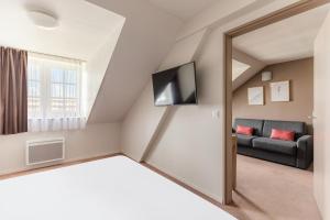 One-Bedroom Apartment room in Appart’City Confort Reims Centre