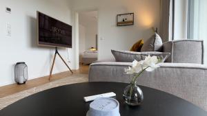 ARYVE Boutique-Apartment DRESDNER PENTHOUSE mit Dachterrasse - Tiefgaragenstellplätze - Design-Interieur