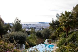 Appartements Bas de villa, vue mer, terrasse, clim, piscine : photos des chambres