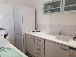 Appartements Bas de villa, vue mer, terrasse, clim, piscine : photos des chambres