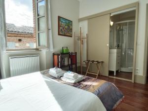 Appartements La Maison des 2 Ponts Clim Centre : photos des chambres