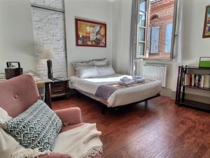 Appartements La Maison des 2 Ponts Clim Centre : photos des chambres