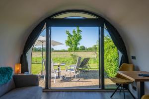 Tiny Natuurlodge voor 2 personen met vrij uitzicht over landerijen