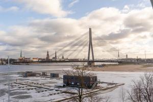 Riverside flat with a beautiful view over Rīga