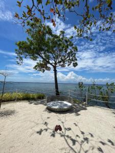 Condo with Private Beach at Tambuli Beach Resort near Airport in Cebu