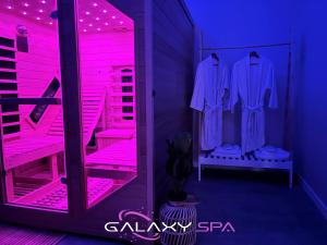 Appartements GALAXY SPA - Suite Venus Jacuzzi et Sauna Privatif : photos des chambres