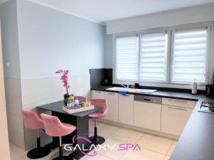 Appartements GALAXY SPA - Suite Venus Jacuzzi et Sauna Privatif : photos des chambres