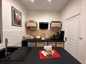 Appartements Orleans Centre - LOVE ROOM - Good Vibes Only BY PRIMO C0NCIERGERIE : photos des chambres