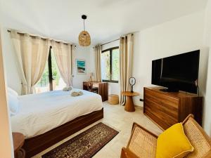 Villas Paisible et Spacieuse Villa avec 4 suites independantes : photos des chambres