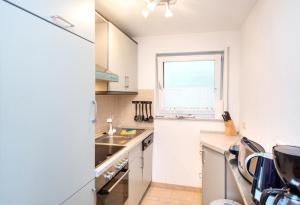 Souterrain-Wohnung mit eigener Terrasse