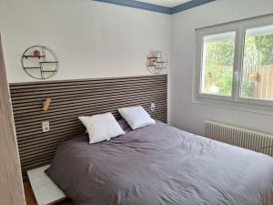 Appartements Duplex pres des Thermes avec jardin : photos des chambres