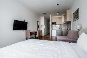 Central studio by In Property