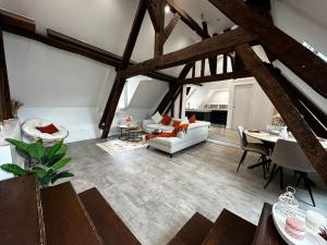 Appartements Charme, poutres et elegance : photos des chambres