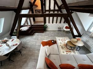 Appartements Charme, poutres et elegance : photos des chambres