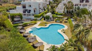 36 Apartment with large garden, pool and padel court in Golf Hills Estepona