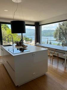 Appartements Grand appartement T4, vue unique lac, terrasse et spa : photos des chambres