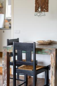 Stijlvol & lief onthaast-huisje met piano, tv en wifi